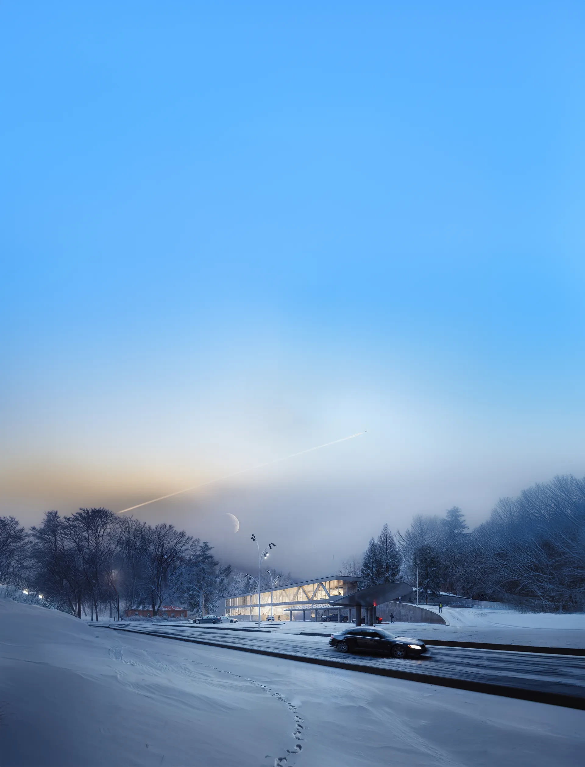 Ladestation an einer winterlichen Straße in der Dämmerung