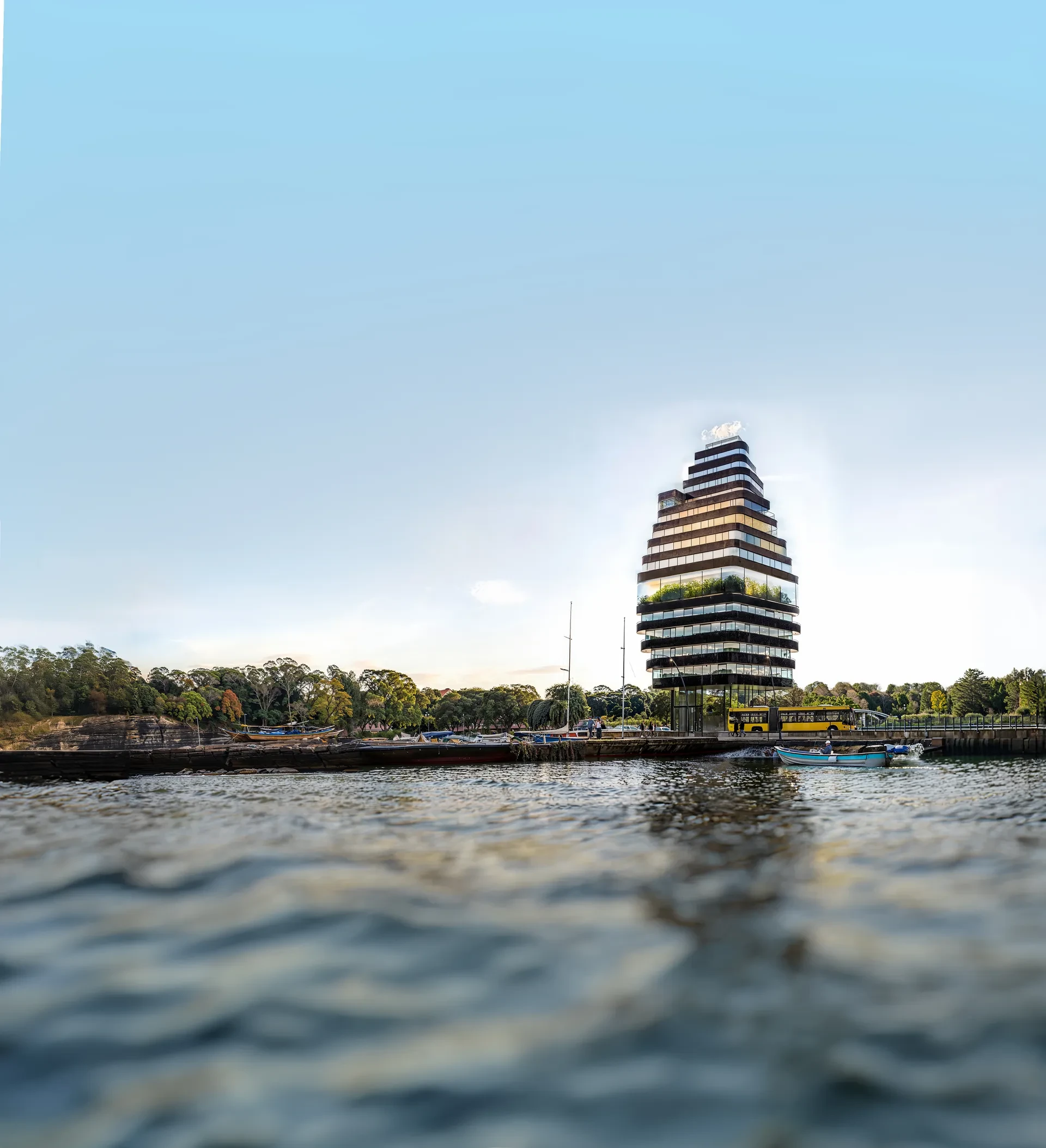 Rounded planted tower seen from the water, Riga