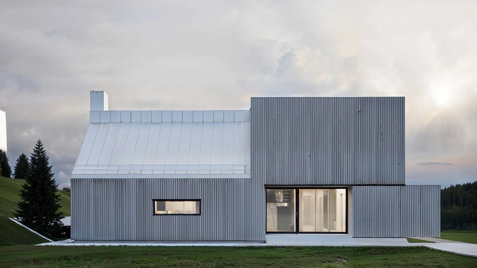 S18, ein Haus mit Fassade aus Wellblech